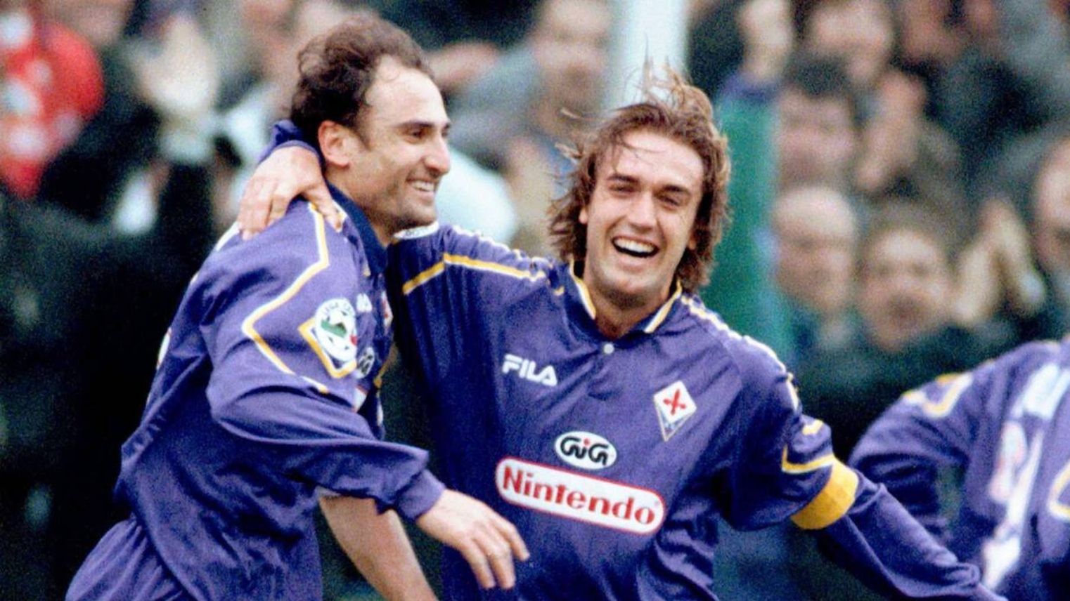 Fiorentina's Argentine striker Gabriel Batistuta, right, and his teammate Salvatore Firicano celebrating after Firicano scored during their Italian first division game against Juventus, in Florence Sunday, Feb. 22, 1998. Fiorentina won 3-0.