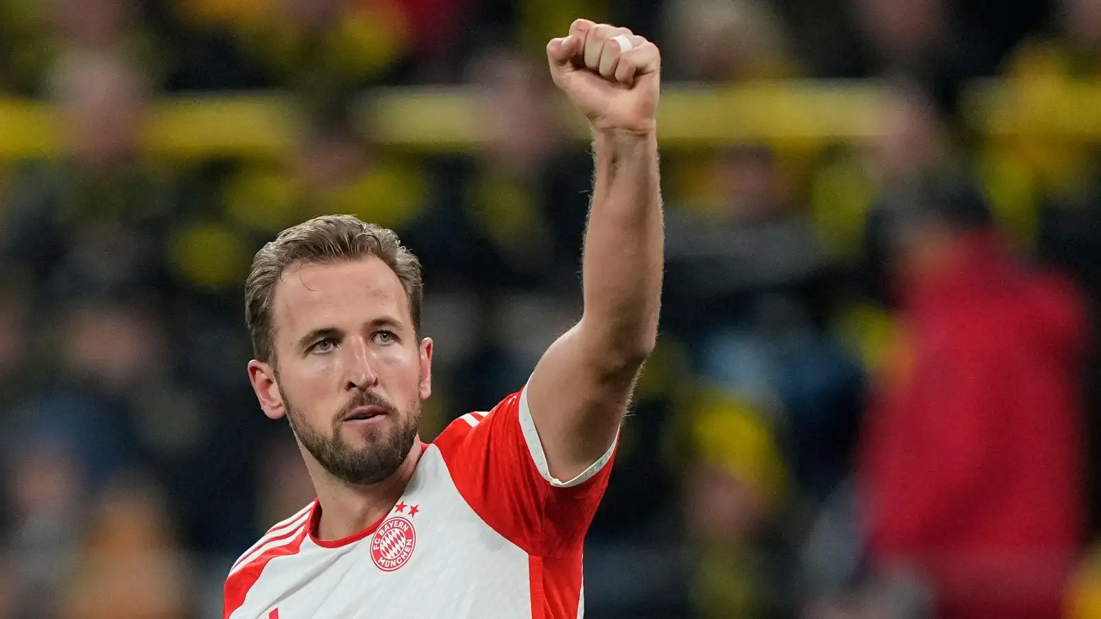 Bayern's Harry Kane celebrates after scoring his side's 3rd goal during the German Bundesliga soccer match between Borussia Dortmund and Bayern Munich in Dortmund, Germany, Saturday, Nov. 4, 2023.