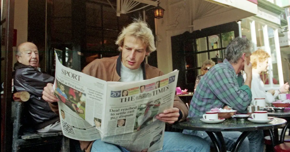 Tottenham signing Jurgen Klinsmann pictured reading The Times newspaper shortly after joining the club in 1994. London, England.