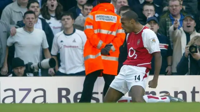 Thierry Henry celebrates scoring against Tottenham in 2002.