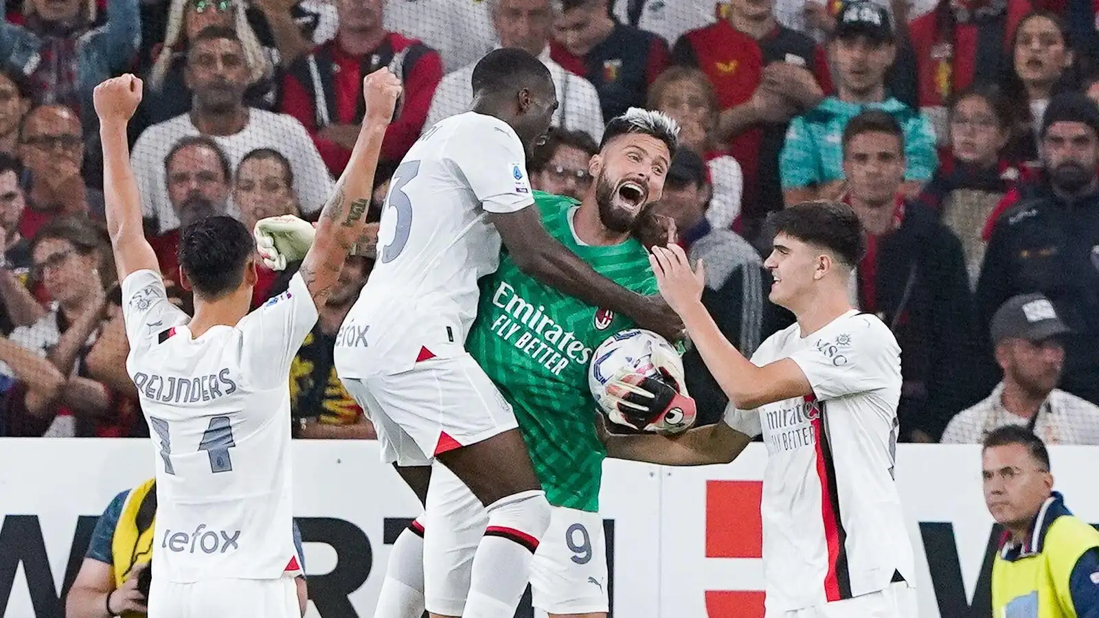 Genoa, Italy. 07th Oct, 2023. Olivier Giroud of AC Milan celebrates the victory with his teammates playing as goalkeeper after Mike Maignan of AC Milan received a red card during the Serie A Tim match between Genoa CFC and AC Milan at Luigi Ferrari Stadium on October 7, 2023 in Genoa, Italy.